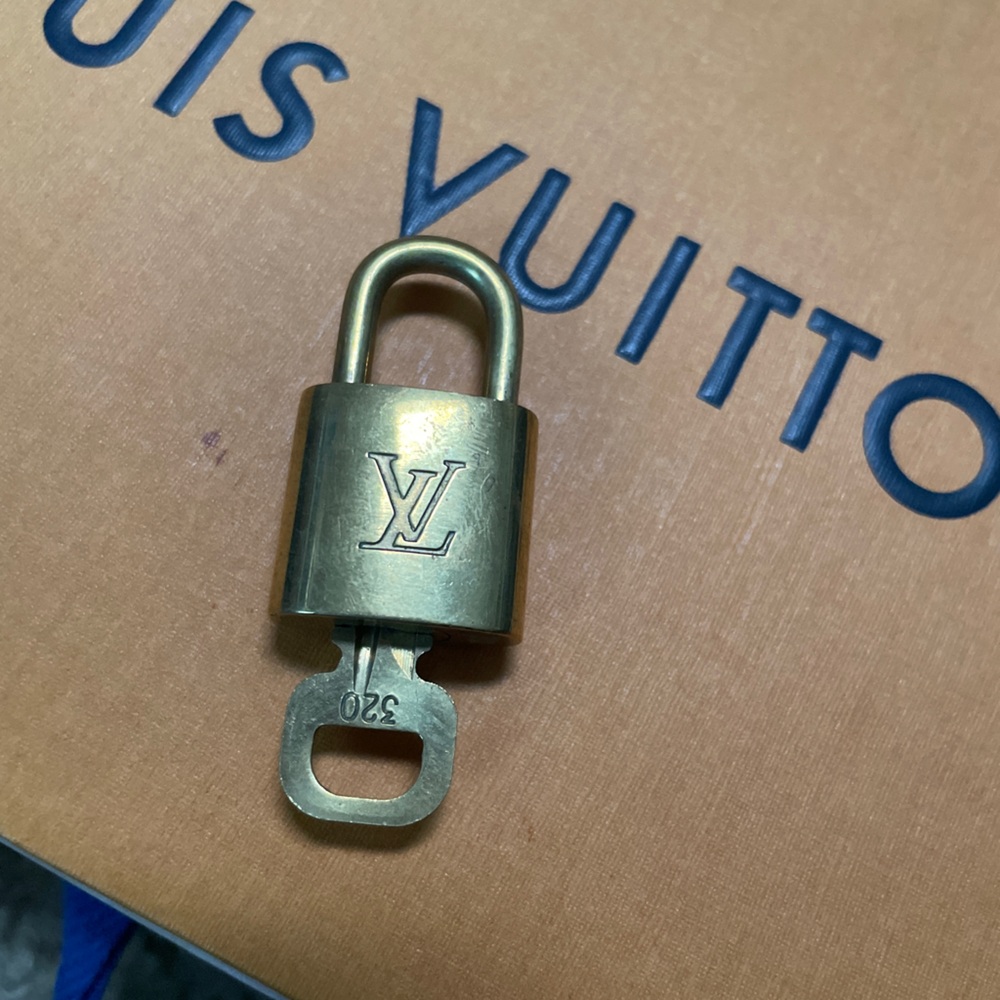 Louis Vuitton brass padlock
